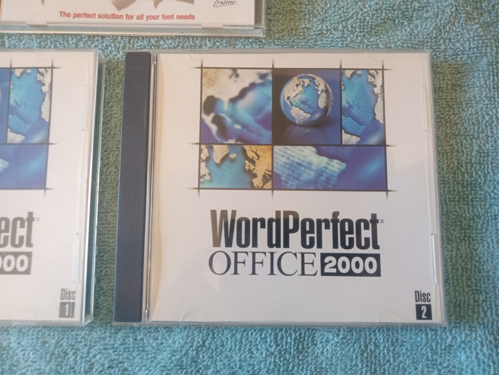 Corel WordPerfect Office 2000 – 2 CD’s And Broderbund Clickart Fonts CD
