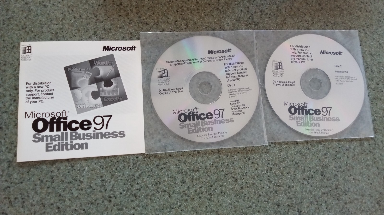 Microsoft Office 97 SMALL BUSINESS EDITION – 4 disc set. Sealed with COA