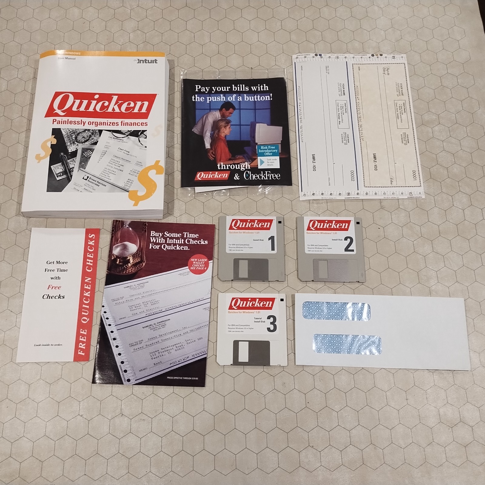 Intuit Quicken 1.01, DOS/Windows, 3.5″ floppy disks, 1992, Tandy