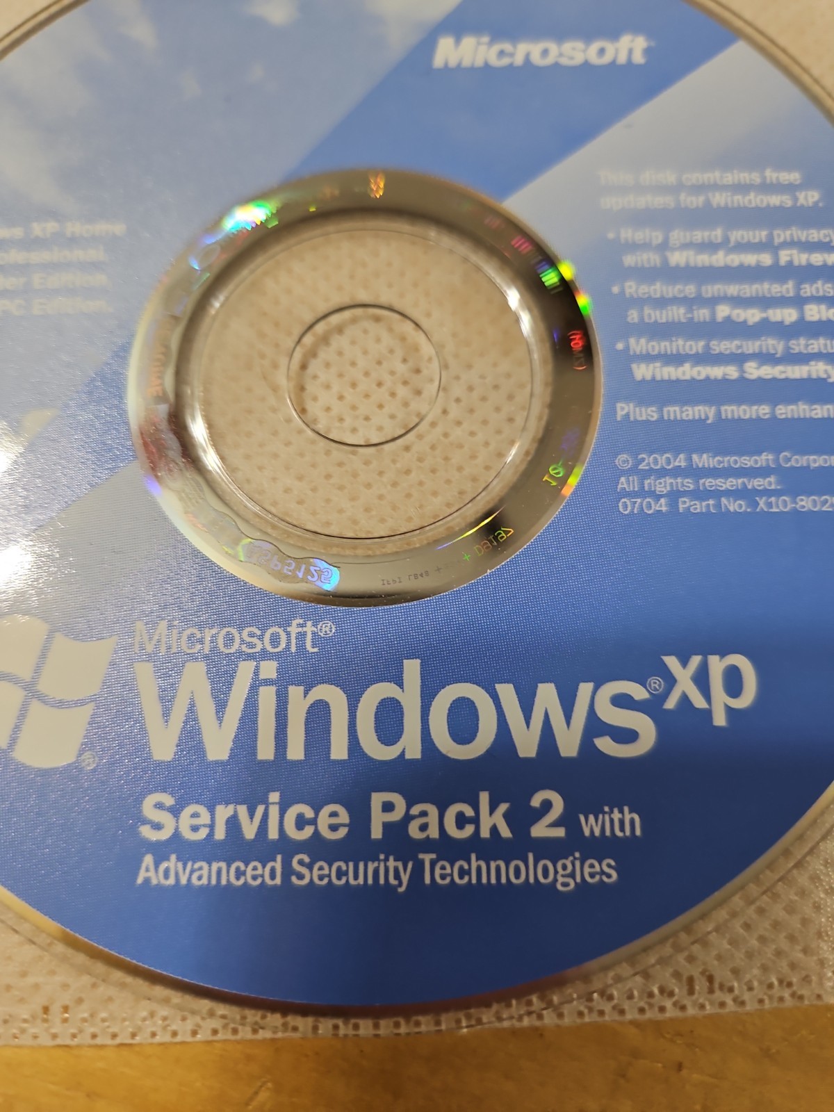 Microsoft Windows XP Service Pack 2 with Advanced Security Technologies disc cd