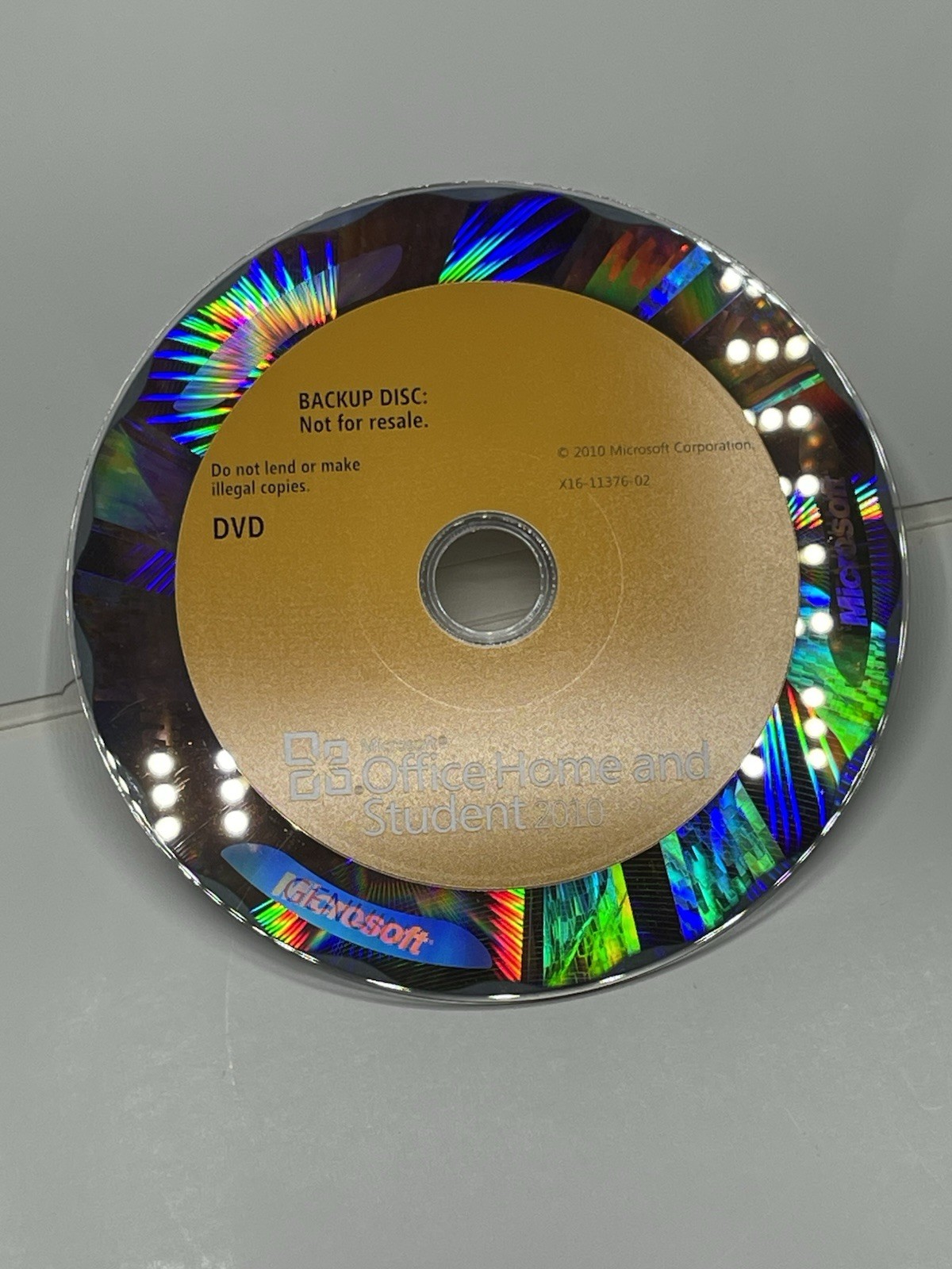 Microsoft Office 2010 Home and Student backup DVD disc.