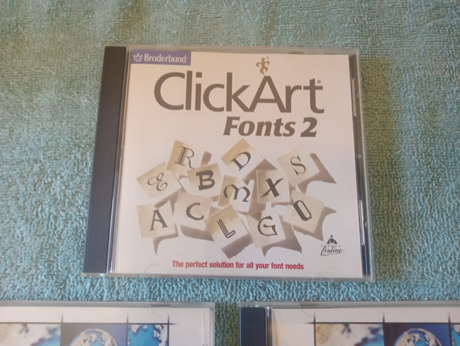 Corel WordPerfect Office 2000 – 2 CD’s And Broderbund Clickart Fonts CD