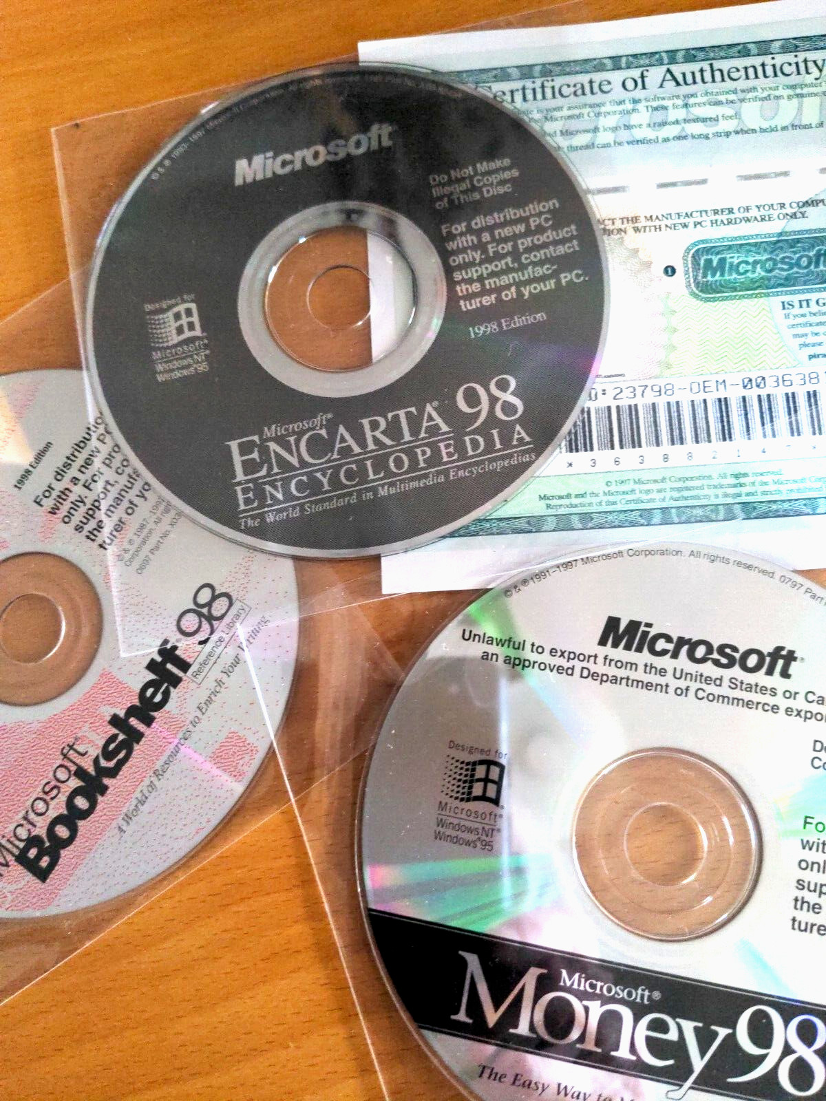 New Microsoft Bookshelf, Money, and Encarta 1998 PC Software, 3 CDs COD