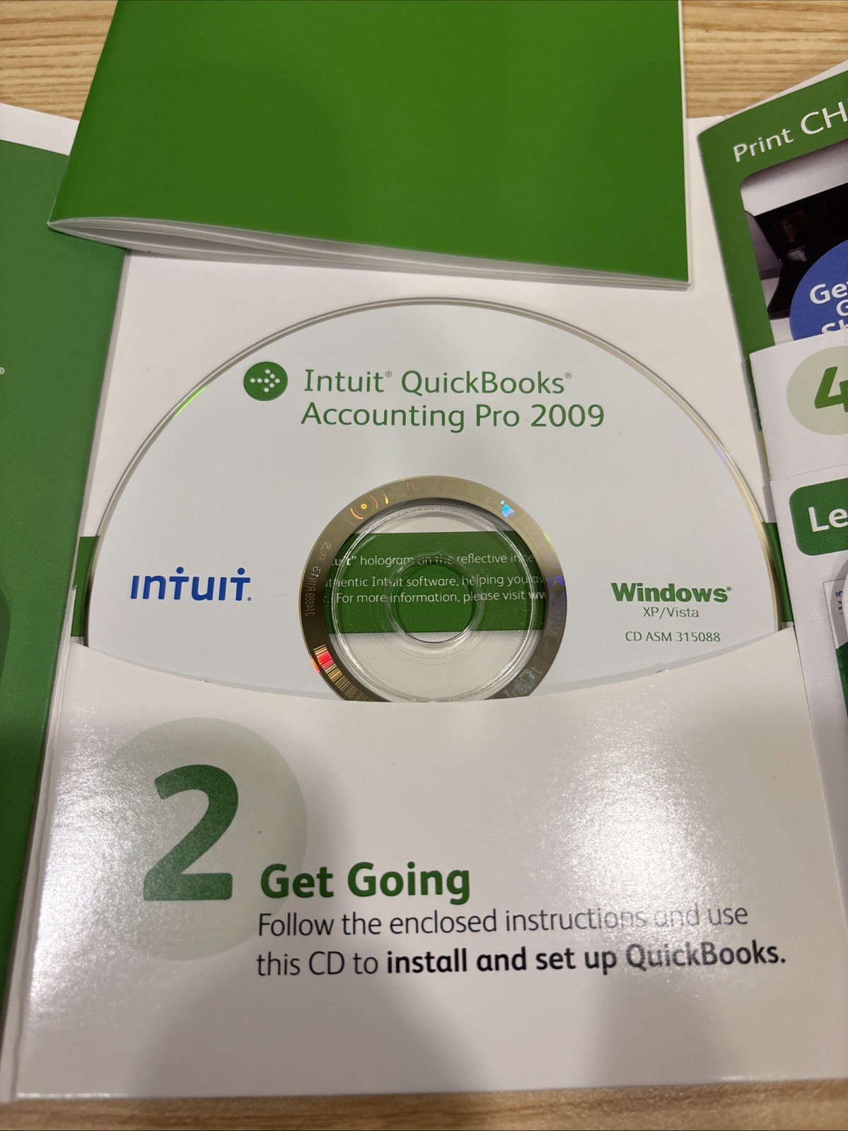 Intuit QuickBooks Pro 2009 Accounting Software For Windows + Learning Quickbooks