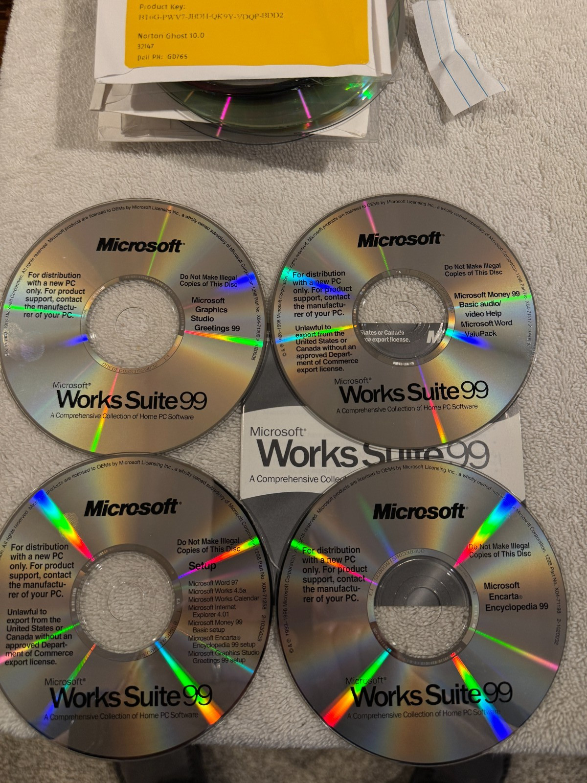 Microsoft Works Suite 99 Four Disc Set with Booklet – NO PRODUCT KEY!!!
