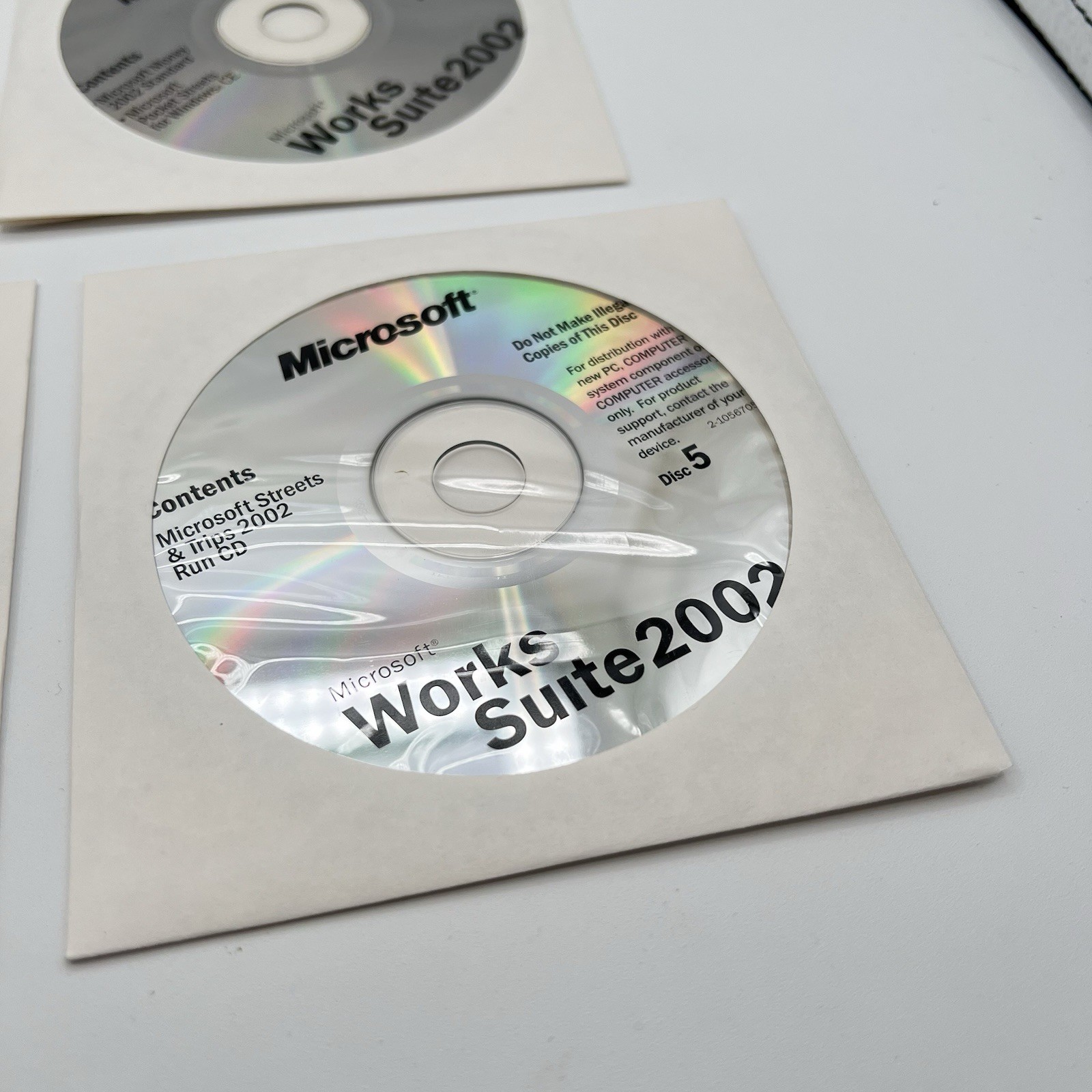 Microsoft Works Suite 2002 w/ product key (Word, Works, Money, Encarta, &c.)